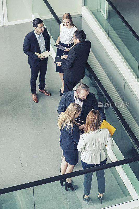 Group of business people in the office building lobby